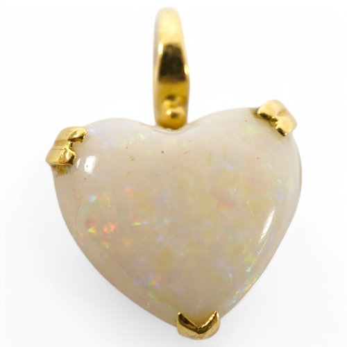 914 - A modern 18ct gold mounted heart shaped white opal pendant, overall 20mm, gross weight 3.2 grams. Co... 