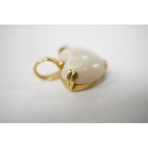 914 - A modern 18ct gold mounted heart shaped white opal pendant, overall 20mm, gross weight 3.2 grams. Co... 