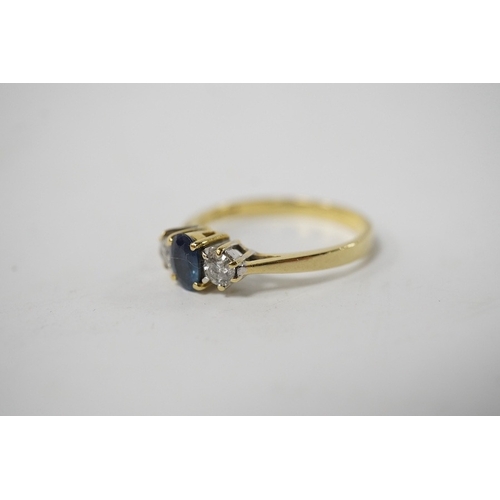 916 - A modern 18ct gold, single stone sapphire and two stone diamond set ring, size Q, gross weight 3 gra... 