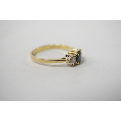 916 - A modern 18ct gold, single stone sapphire and two stone diamond set ring, size Q, gross weight 3 gra... 