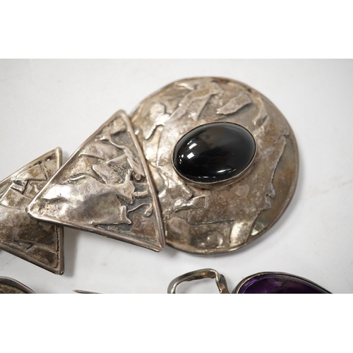 919 - Elaine Coyne- A late 1980's modernist silver and cabochon garnet set drop brooch, 11.8cm, a pair of ... 