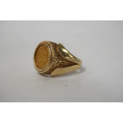 921 - A 9ct gold ring set with a gold Mexican Two Peso coin, size R1/2, British hallmarks, gross weight ap... 