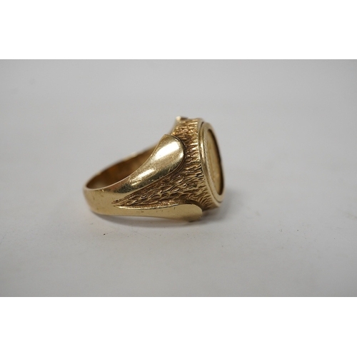 921 - A 9ct gold ring set with a gold Mexican Two Peso coin, size R1/2, British hallmarks, gross weight ap... 