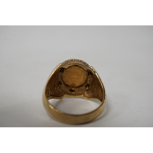 921 - A 9ct gold ring set with a gold Mexican Two Peso coin, size R1/2, British hallmarks, gross weight ap... 