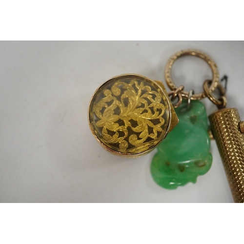 922 - An unmarked yellow metal vinaigrette, 18mm, together with a yellow metal overlaid combination propel... 