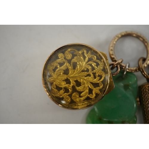 922 - An unmarked yellow metal vinaigrette, 18mm, together with a yellow metal overlaid combination propel... 