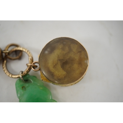 922 - An unmarked yellow metal vinaigrette, 18mm, together with a yellow metal overlaid combination propel... 