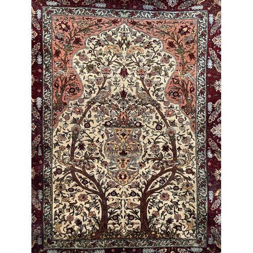 99 - An Isfahan ivory ground part silk Tree of Life rug, 102 x 138cm. Condition - good