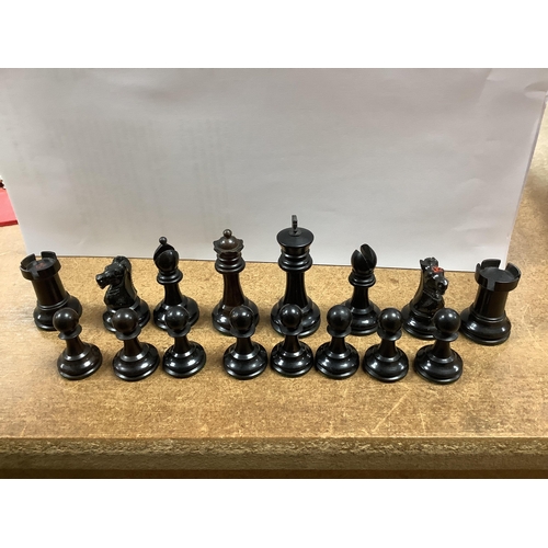 1447 - A chess set, possibly F H Ayres, in a mahogany box, and another larger weighted chess set, in box,  ... 