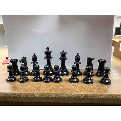 1447 - A chess set, possibly F H Ayres, in a mahogany box, and another larger weighted chess set, in box,  ... 