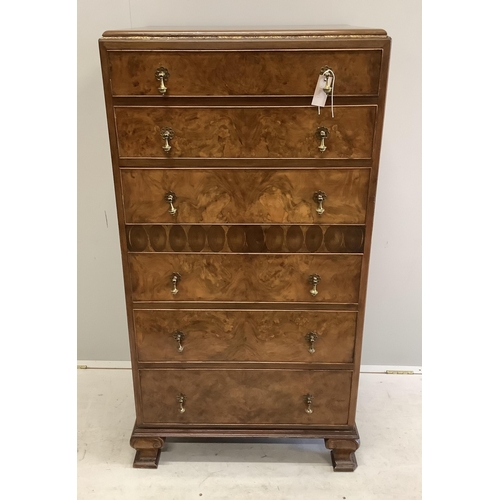 1002 - A Queen Anne Revival figured walnut and laburnam oyster veneered six drawer tall chest, width 70cm, ... 