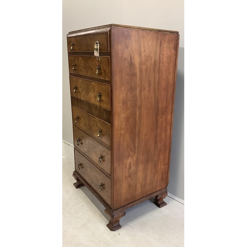 1002 - A Queen Anne Revival figured walnut and laburnam oyster veneered six drawer tall chest, width 70cm, ... 