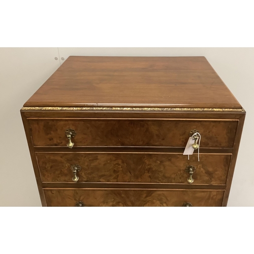 1002 - A Queen Anne Revival figured walnut and laburnam oyster veneered six drawer tall chest, width 70cm, ... 