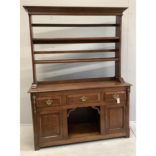 1003 - An 18th century style oak 'dog kennel' dresser, with boarded rack, width 138cm, depth 41cm, height 1... 