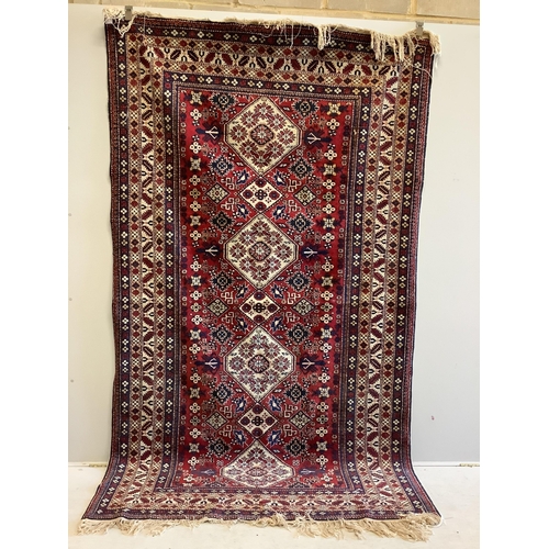 1008 - A Kazak red ground rug, 280 x 163cm. Condition - good