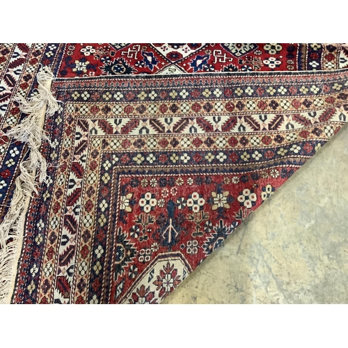 1008 - A Kazak red ground rug, 280 x 163cm. Condition - good