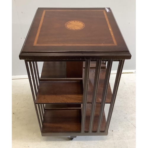 1009 - An Edwardian style inlaid mahogany revolving bookcase, width 47cm, depth 47cm, height 85cm. Conditio... 