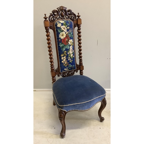 1014 - A pair of Victorian carved walnut side chairs with polychrome floral upholstered backs, width 46cm, ... 