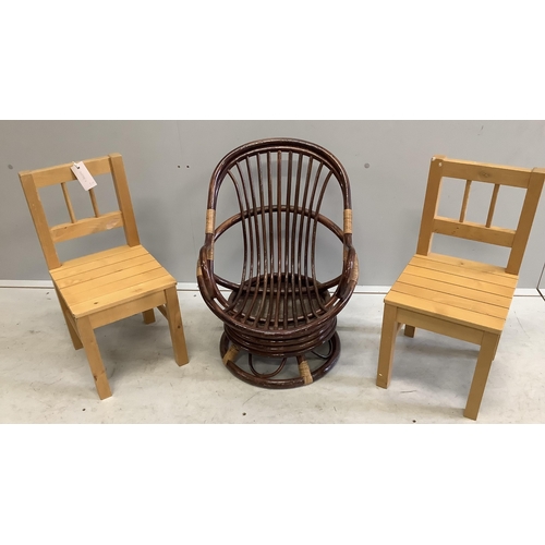 1034 - A pair of beech child's chairs together with a bamboo swivel child's chair, largest width 45cm, heig... 