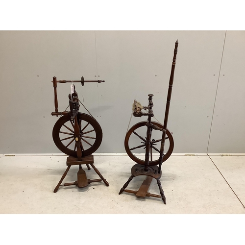 1038 - Two 19th century spinning wheels, larger height 124cm. Condition - fair