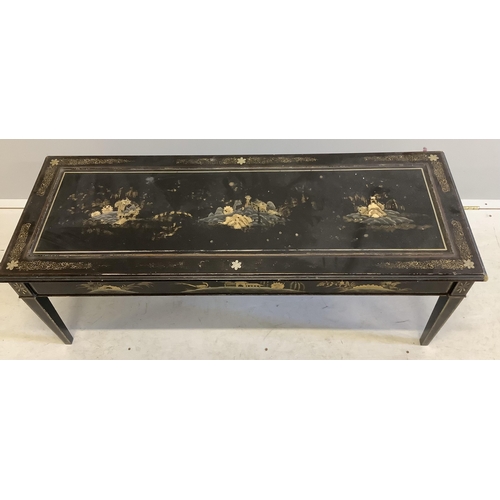 1045 - A rectangular black lacquered coffee table, width 120cm, depth 46cm, height 44cm. Condition  - poor ... 