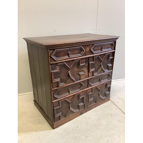 1055 - An 18th century geometric moulded oak chest, width 95cm, depth 54cm, height 86cm. Condition - fair... 