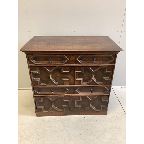 1055 - An 18th century geometric moulded oak chest, width 95cm, depth 54cm, height 86cm. Condition - fair... 