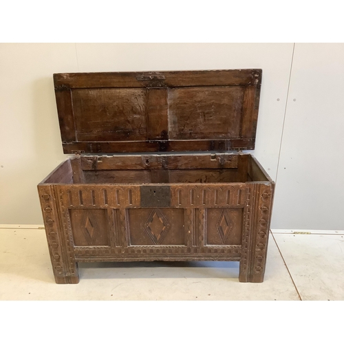 1060 - A 17th century and later carved oak coffer, width 118cm, depth 48cm, height 61cm. Condition - fair... 