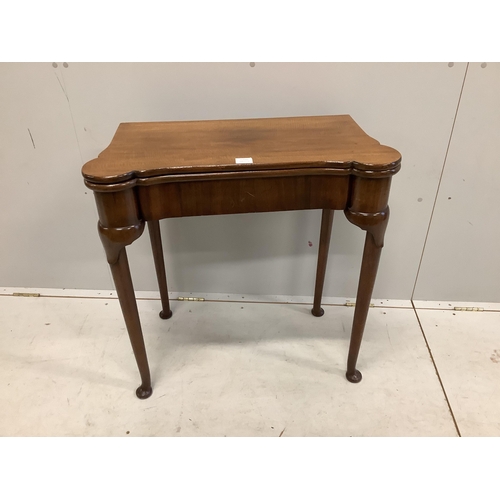 1064 - A George II style mahogany folding card table, width 75cm, depth 38cm, height 76cm. Condition - fair... 