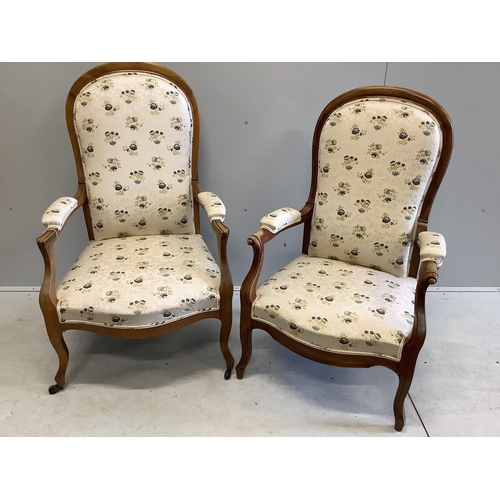 1076 - A near pair of Continental upholstered open armchairs, larger width 67cm, depth 58cm, height 114cm. ... 