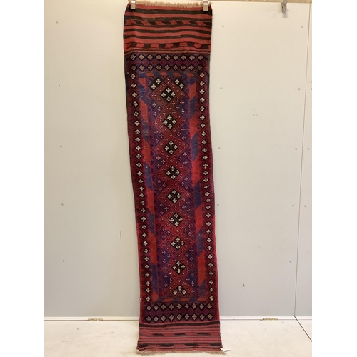 1077 - An Afghan geometric runner, 266 x 61cm. Condition - fair