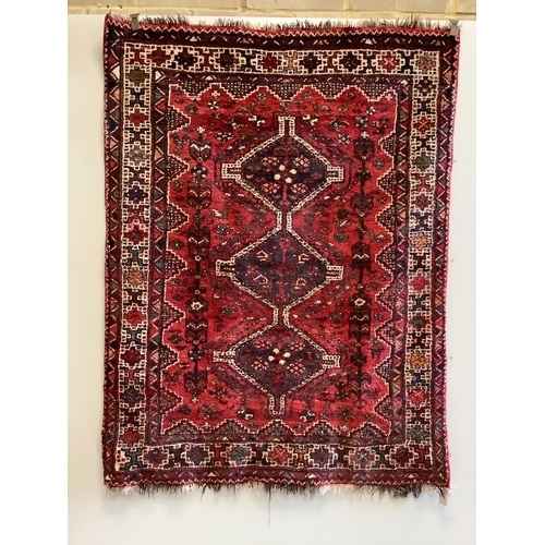 1078 - A Shiraz red ground rug, 200 x 157cm. Condition - fair