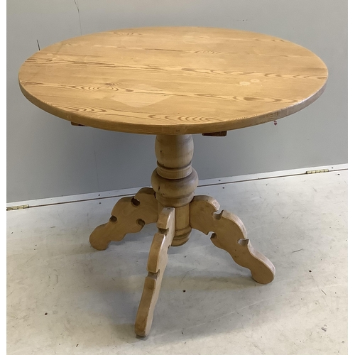 1085 - A Victorian style circular pine centre table, diameter 83cm, height 75cm. Condition - fair