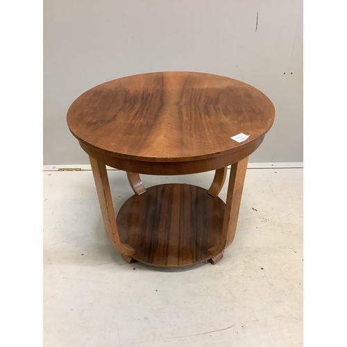 1091 - An Art Deco walnut circular two tier occasional table, diameter 60cm, height 52cm. Condition - fair... 