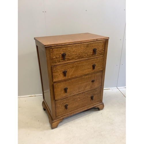 1101 - An early 20th century oak chest of four drawers, width 76cm, depth 46cm, height 104cm. Condition - g... 