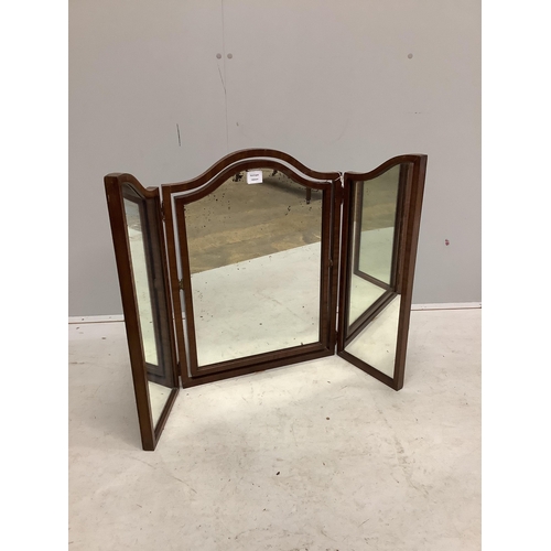 1105 - An early 20th century mahogany triple plate toilet mirror, height 67cm. Condition - fair, plate spot... 