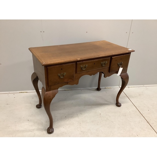 1108 - An 18th century style oak kneehole dressing table on cabriole legs, width 105cm, depth 53cm, height ... 