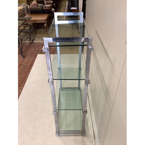 1126 - A chrome and glass four tier shelf unit, width 86cm, depth 38cm, height 130cm. Condition - fair... 