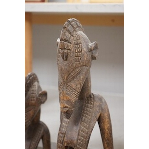 1313 - Three African tribal figural carvings including one Dogon maternity figure, largest 82cm. Condition ... 