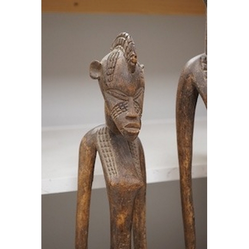 1313 - Three African tribal figural carvings including one Dogon maternity figure, largest 82cm. Condition ... 