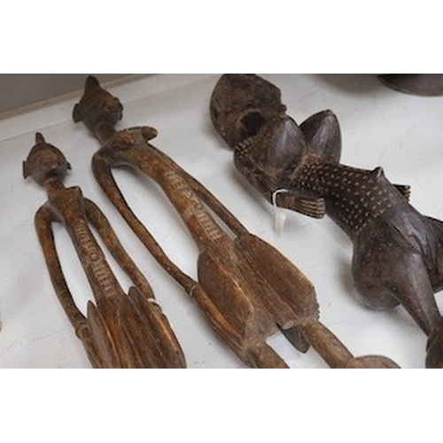 1313 - Three African tribal figural carvings including one Dogon maternity figure, largest 82cm. Condition ... 