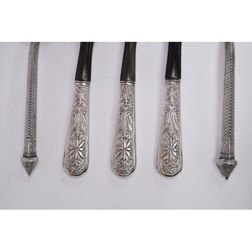 1829 - A pair of Malaysian/Indonesian white metal salad servers, fork 25.7cm and three other similar white ... 