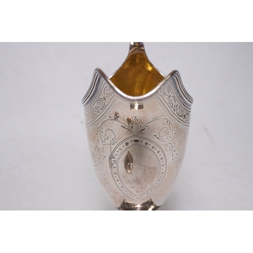 1833 - A George III silver helmet shaped cream jug by Peter & Ann Bateman, London, 1792, 14.4cm, together w... 