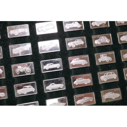 1834 - A cased set of one hundred 925 ingots, each depicting a different car model, each 27mm and weighing ... 