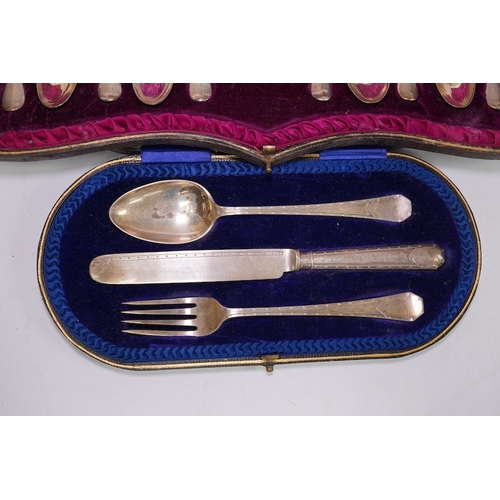 1841 - A cased Edwardian silver Christening trio, by Henry Wigful, Sheffield, 1909 and a cased set of eleve... 