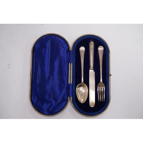 1841 - A cased Edwardian silver Christening trio, by Henry Wigful, Sheffield, 1909 and a cased set of eleve... 