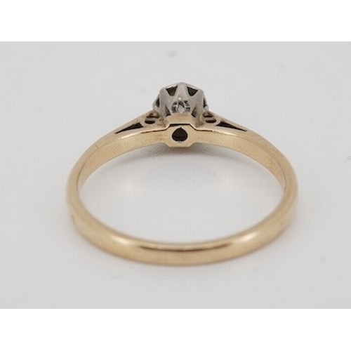 1903 - A solitaire diamond ring, collet-set with an antique circular-cut diamond weighing approximately 0.2... 