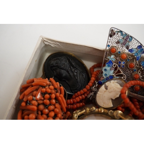 1926 - A Victorian yellow metal and coral bead set mourning brooch, with plaited hair beneath a glazed pane... 