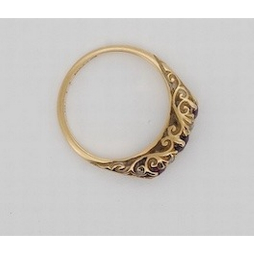 1932 - An Edwardian 18ct gold, three stone ruby and four stone diamond set half hoop ring, size K, gross we... 