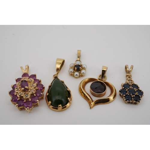 1937 - A modern 9ct gold and pear shaped nephrite set pendant, overall 25mm, a similar 9ct gold and garnet ... 